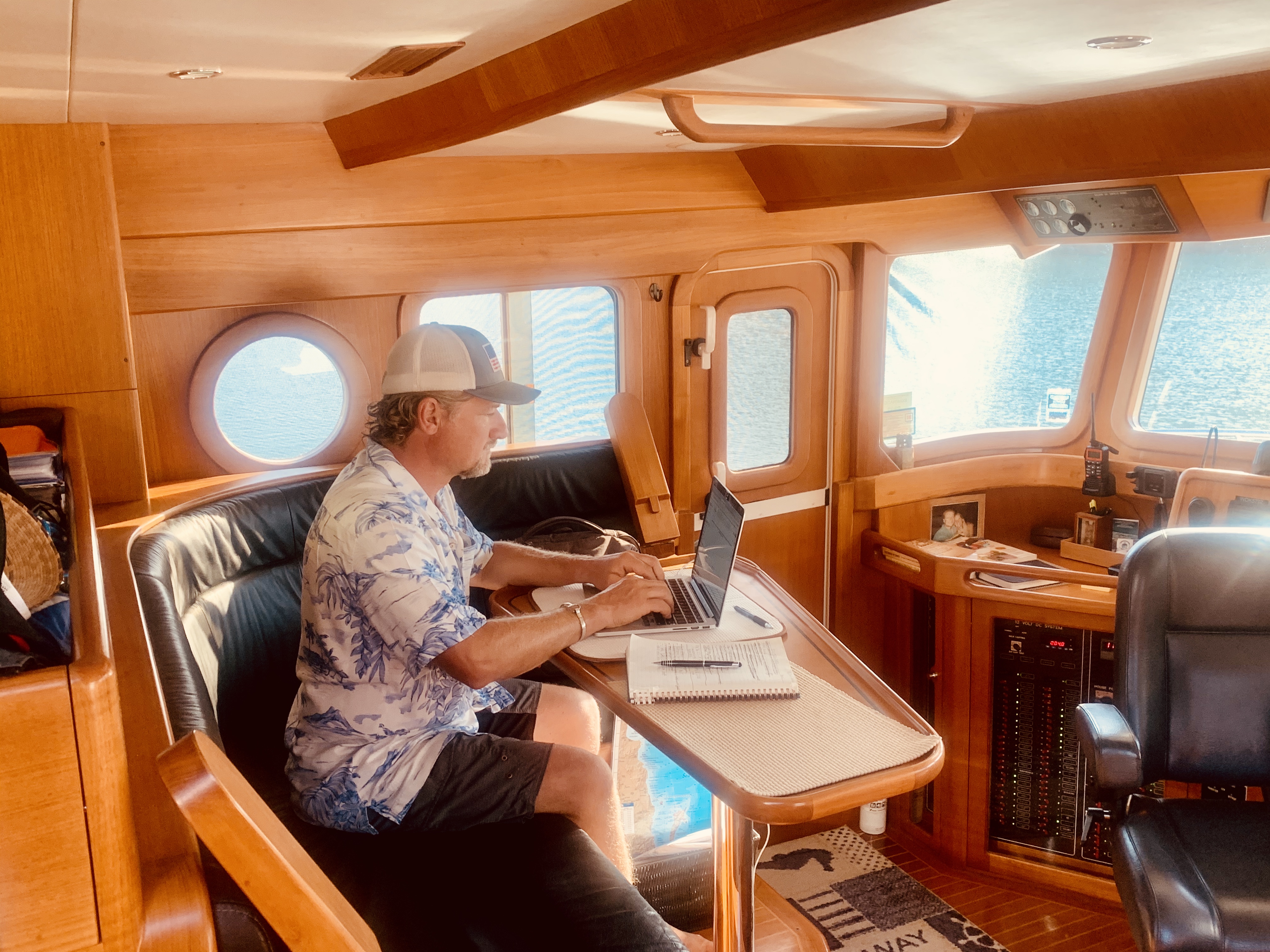 Rob working from the pilothouse aboard Selene 55, Bella Luna. 